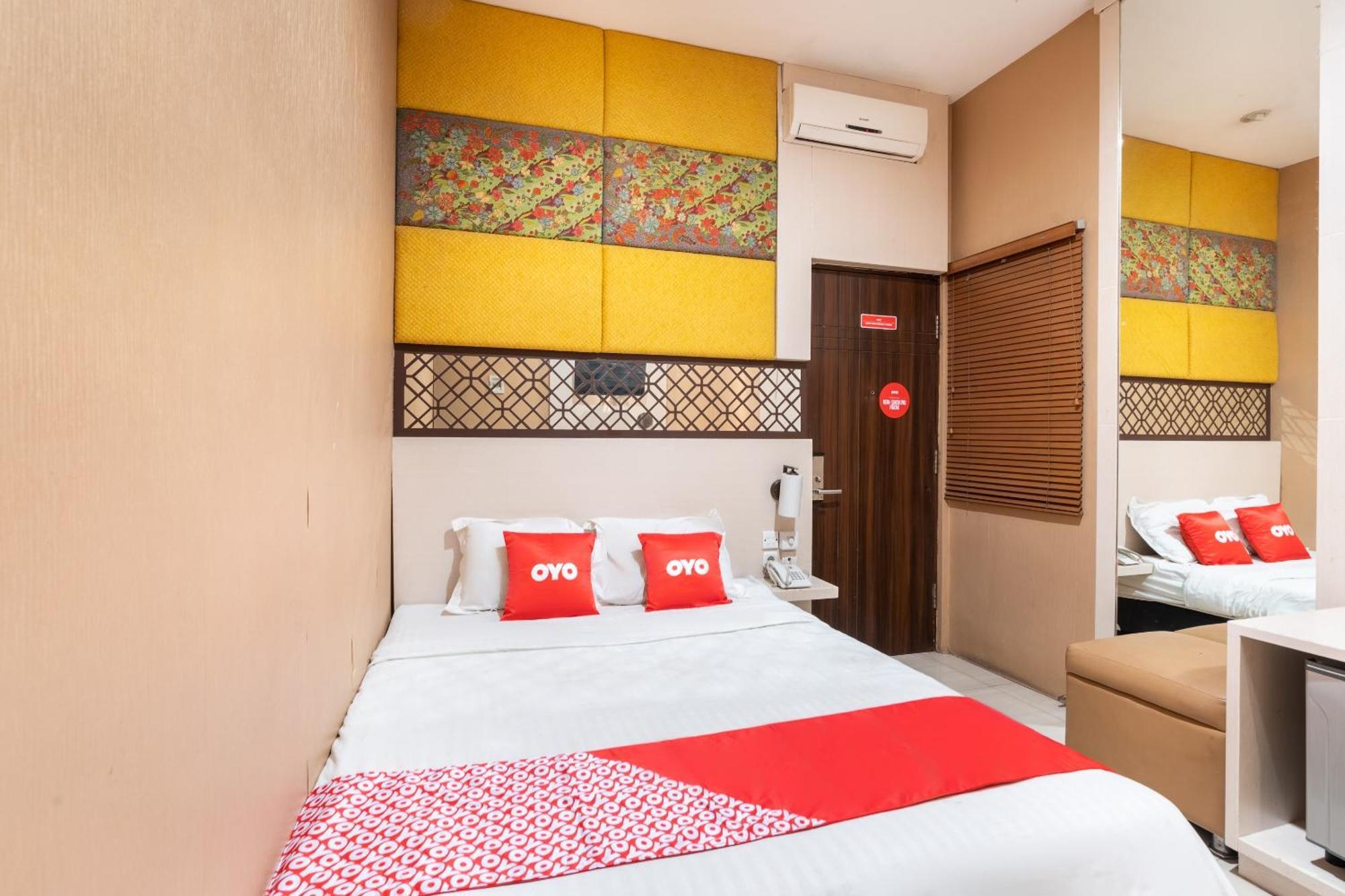 Super Oyo Flagship 91863 Metro House Hotel Surabaya Luaran gambar